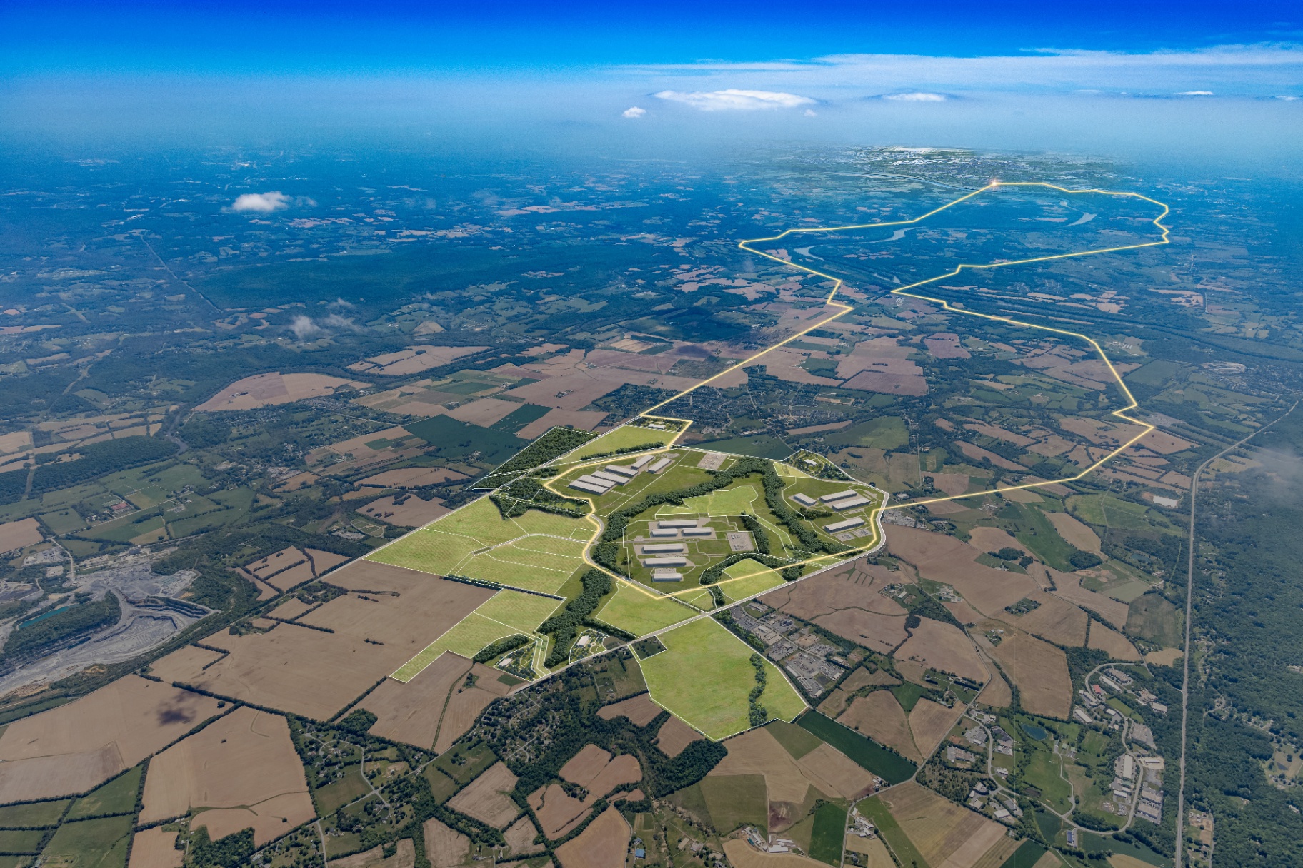 Aerial view of the campus site within the broader Frederick landscape.